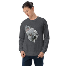 Load image into Gallery viewer, A man is wearing a unisex sweatshirt in the colour dark heather grey, printed with a graphic split into two: the left side features the face of a koala bear, and the right side features an evil looking koala skull.
