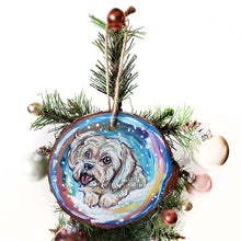 Load image into Gallery viewer, A wood ornament with art of a white Havanese dog in front of a snowy background
