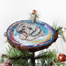 Load image into Gallery viewer, A wood Christmas ornament hand painted with a white Havanese dog in front of a snowy background
