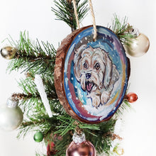 Load image into Gallery viewer, A wood Christmas ornament featuring a portrait of a white Havanese dog in front of a snowy background
