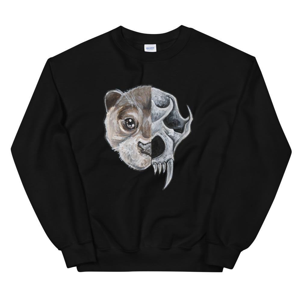 A unisex sweatshirt in the colour black, printed with an illustration split into two: the left side features the face of an otter, and the right side features an evil looking otter skull.