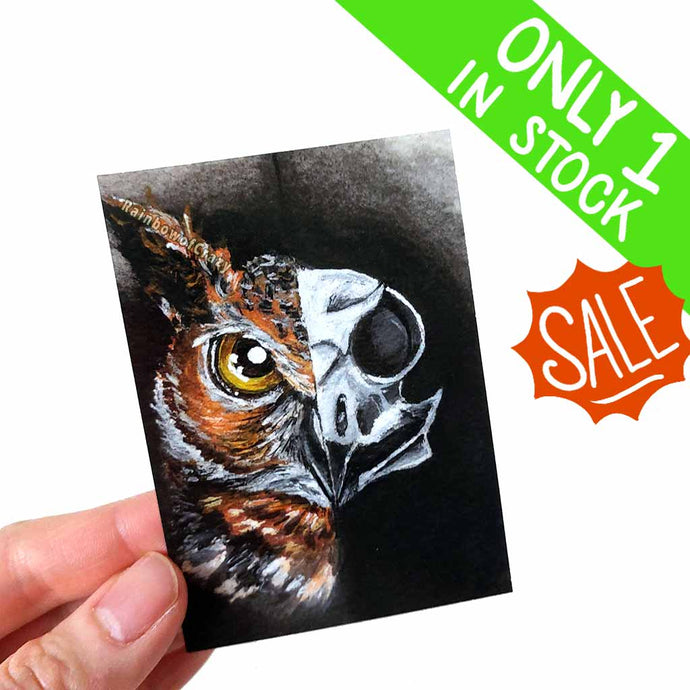 an aceo art print that features a Great Horned Owl on one side and a spooky owl skull on the other