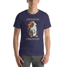 Load image into Gallery viewer, A man wears a unisex t-shirt in the colour heather navy blue, which features art of a bunny rabbit with a pancake on its head. The shirt reads, &quot;I have no idea what you&#39;re talking about / So here&#39;s a bunny with a pancake on its head&quot;
