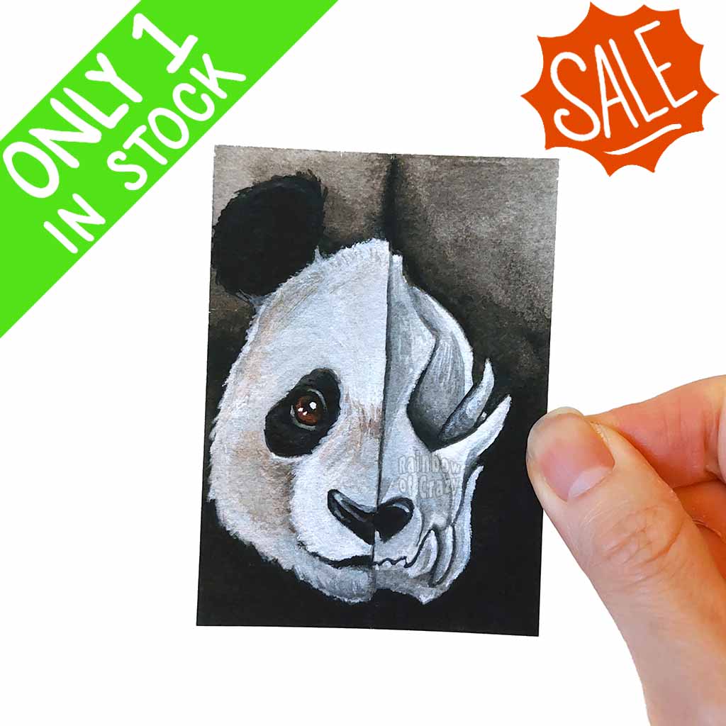an aceo print of a split portrait: a panda's face on the left, and a stylized panda skull on the right side. 