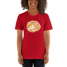 Load image into Gallery viewer, A woman wears a Pizza Cat Unisex Premium T-Shirt in the colour red, which features an illustration of a Turkish Van cat as a Hawaiian pizza with pineapple and ham.
