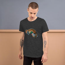 Load image into Gallery viewer, A man is wearing the Platypus Duck Premium T-Shirt in the colour dark grey heather, which includes a print of platypus booping a mallard duck
