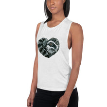 Load image into Gallery viewer, A woman is wearing the Raccoon Love Women&#39;s Muscle Tank Top, in the colour white, which is printed with a graphic of a raccoon forming the shape of a heart.
