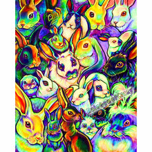 Load image into Gallery viewer, an art print featuring an illustration of 22 different rabbit breeds, painted in rainbow colours
