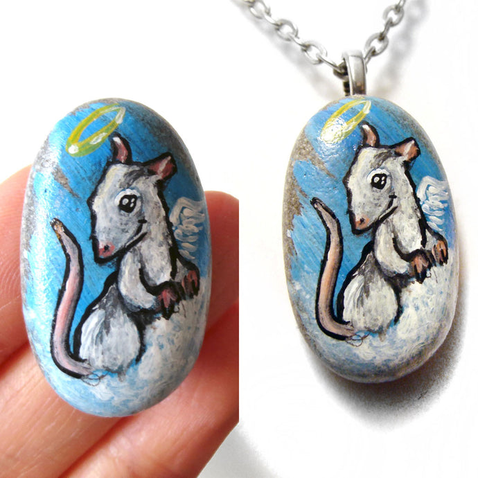 a pet portrait of a white and grey rat as an angel on clouds, painted on a beach rock. available as a beach stone or a pendant necklace