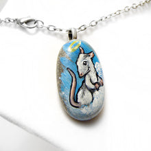 Load image into Gallery viewer, the rat angel necklace, painted on a beach stone, hangs from a chain with a lobster clasp
