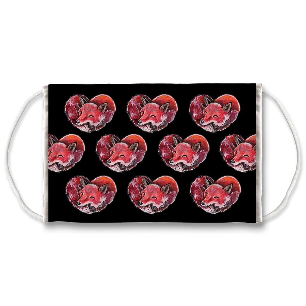 A reusable face mask, patterned with art of a red fox sleeping in the shape of a heart.