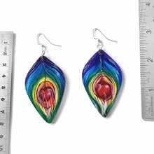 Load image into Gallery viewer, large, leaf shaped, wood fish hook earrings, hand painted with peacock feathers in rainbow colours
