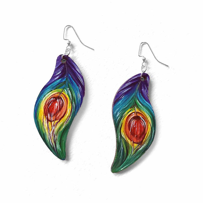large, leaf shaped, wood fish hook earrings, hand painted with peacock feathers in rainbow colours