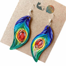 Load image into Gallery viewer, large, leaf shaped, wood fish hook earrings, hand painted with peacock feathers in rainbow colours
