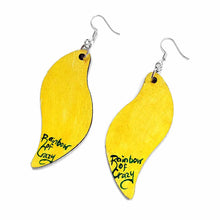 Load image into Gallery viewer, large, long, leaf shaped, wood fish hook earrings, hand painted with yellow on the back, signed with, Rainbow of Crazy
