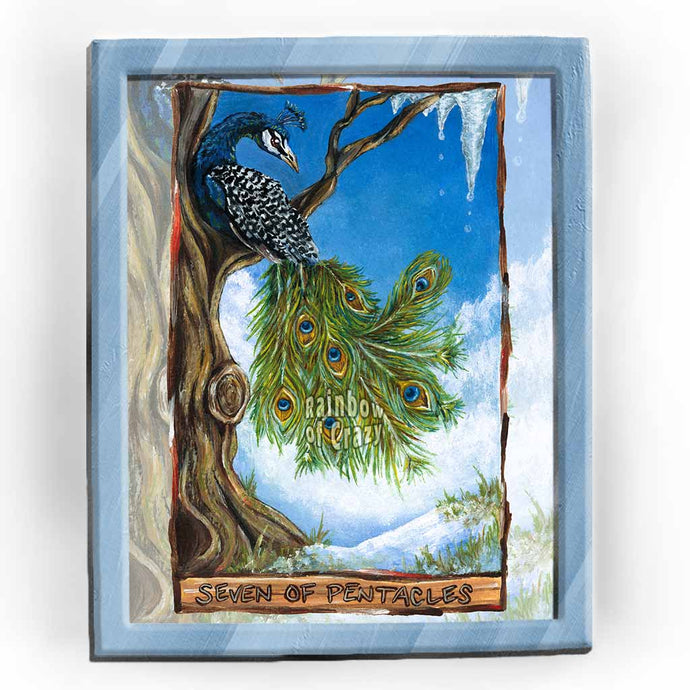 an art print of the seven of Pentacles tarot card, from the animism tarot: a peacock rests high up in a tree, watching the cold winter snow melt away, making way for the upcoming spring.