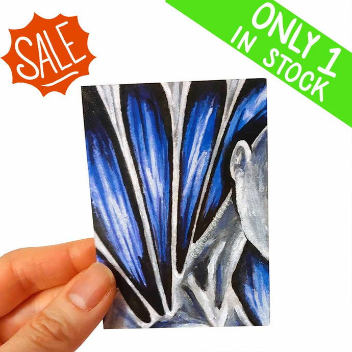 an aceo featuring an abstract image of a figures shoulder splitting and stretching out to the end of the image.