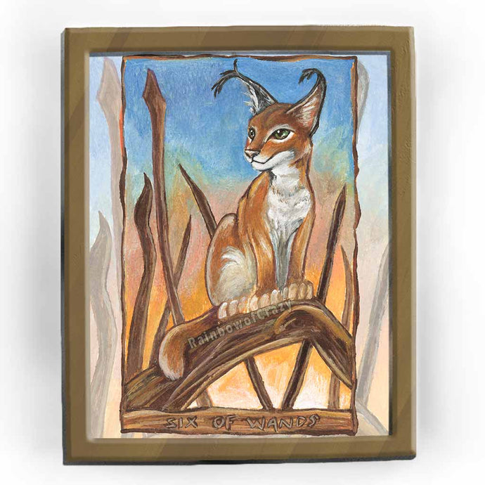 an art print of the six of wands tarot card from the animism tarot deck. a caracal cat stands on a curved tree trunk, as the sun sets.