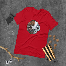 Load image into Gallery viewer, A premium unisex t-shirt in the colour red, features an illustration of a split image: a skull&#39;s face on the left side and a sloth skull on the right.
