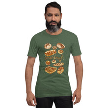 Load image into Gallery viewer, A man is wearing the Sourdough Lovers unisex premium t-shirt in the colour forest green heather, printed with art of 10 different sourdough breads.
