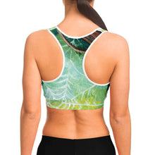 Load image into Gallery viewer, A woman wearing sports bra printed with an illustration of an orb weaver spider in front of its spider web.
