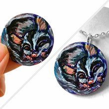 Load image into Gallery viewer, A painting of a sleeping sugar glider, hand painted on a small, smooth, wood circle. Available as a keepsake art or pendant necklace
