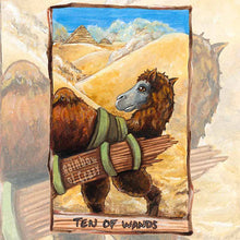 Load image into Gallery viewer, an art print of the ten of wands tarot card, from the animism tarot: a bactrian camel crosses the desert sands, wiith a load of sticks on its back, it looks over at the pyramids in the background
