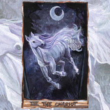 Load image into Gallery viewer, an art print of the chariot tarot card, from the animism tarot: a white horse runs through a dark forest while the crescent moon shines in the night sky
