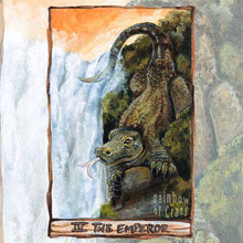 Load image into Gallery viewer, an art print of the emperor tarot card, from the animism tarot: a komodo dragon stands neat the top of a waterfall, looking over the land.
