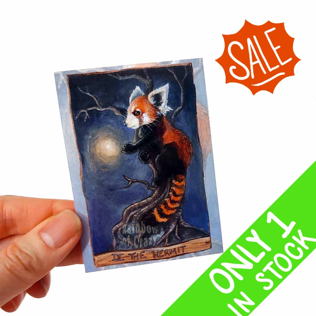 an aceo art print features The Hermit tarot card from the Animism Tarot: a red panda stands up from a tree in the night, reaching a paw up at a glowing firefly.
