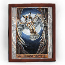 Load image into Gallery viewer, an art print of the high priestess tarot card from the animism tarot: a striped owl, with wings spread, flies in between two trees with the full moon shining behind her.
