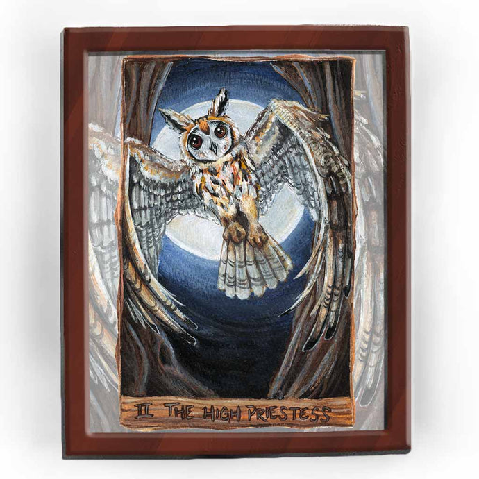 an art print of the high priestess tarot card from the animism tarot: a striped owl, with wings spread, flies in between two trees with the full moon shining behind her.