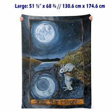Load image into Gallery viewer, A micro-mink blanket lined with microfiber fleece, featuring a print of The Moon card, from The Animism Tarot: A white rabbit peers into a strange reflection in the water.. the moon and reflections shine differently

