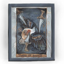 Load image into Gallery viewer, This art print features the Three of Swords tarot card from the Animism Tarot: a bleeding heart dove lies on the ground, defeated, as one sword pierces through its chest, one through its wing, and one stands near its head
