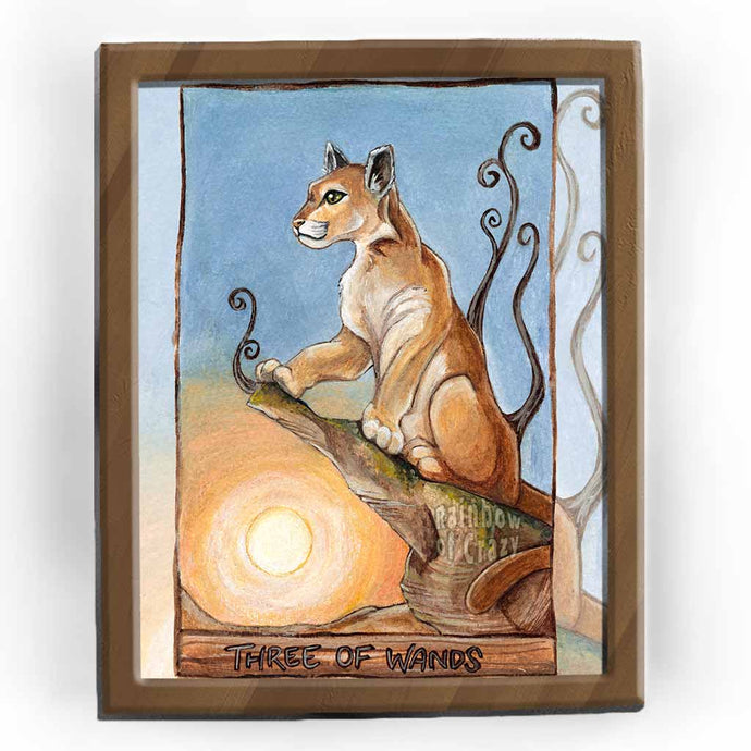 the three of wands from the animism tarot deck: a cougar sits off to of a cliff and looks out into the distance.