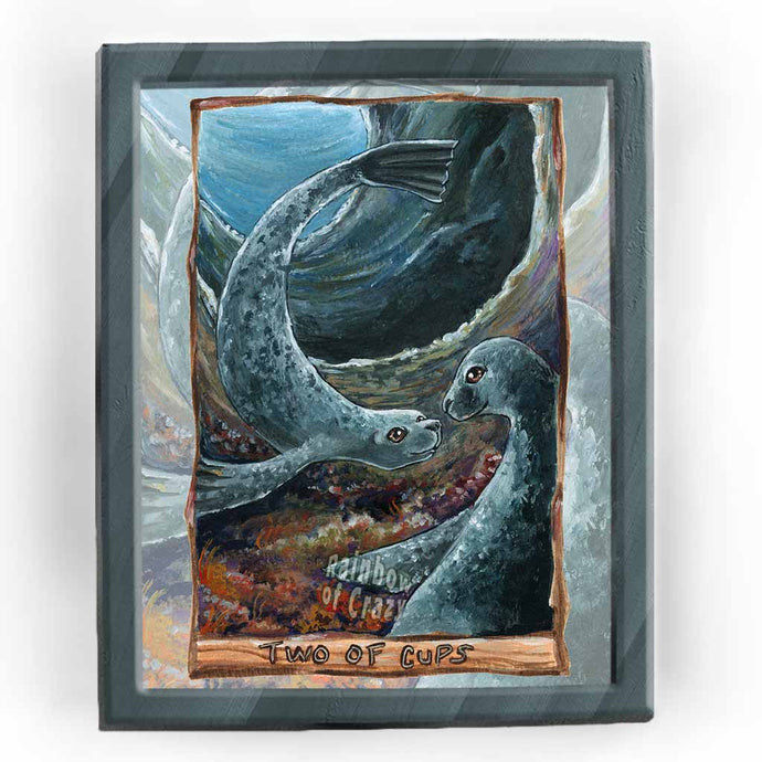 This art print features the Two of Cups tarot card from the Animism Tarot: two curious seal have their first encounter, deep in a cave in the ocean.