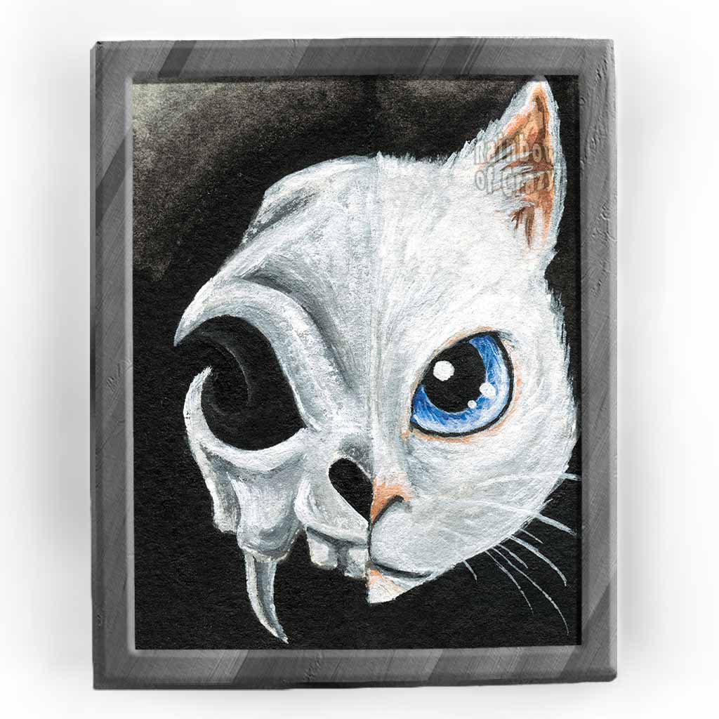 An art print featuring the face of a blue eyed white cat on the right side, and a stylized cat skull on the left side.