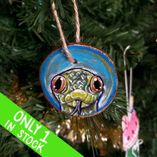 Load image into Gallery viewer, A tree ornament, hand painted with art of a yellow anaconda snake
