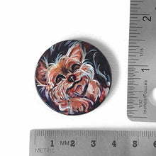 Load image into Gallery viewer, a small wood circle, hand painted with a sleeping, smiling, yorkshire terrier, available as a keepsake or pendant necklace
